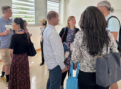Participants gather at break time