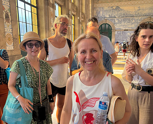 Guide Célia Vieira ends the tour at the historic Porto São Bento train station  